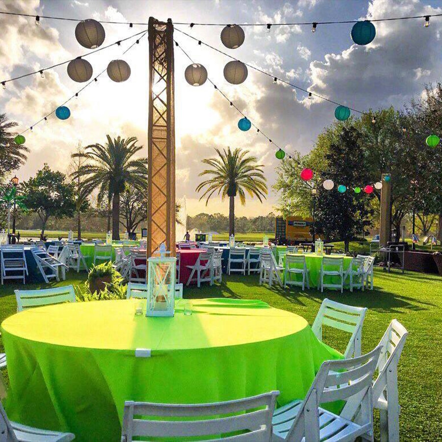 Outdoor exclusive gathering with colorful round tables