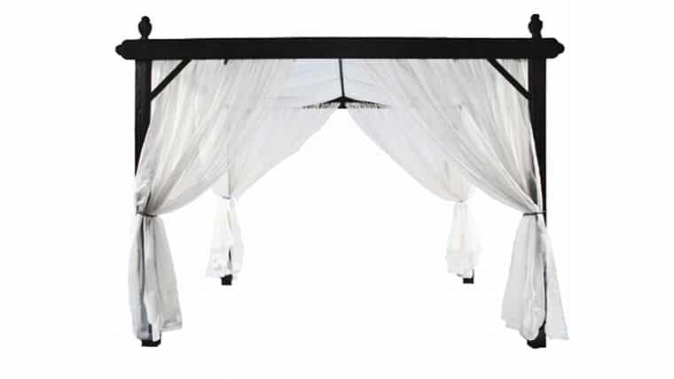 Small Black Cabana with sheer white curtains tied back at the corners, creating an elegant and airy space. The backdrop is plain white.