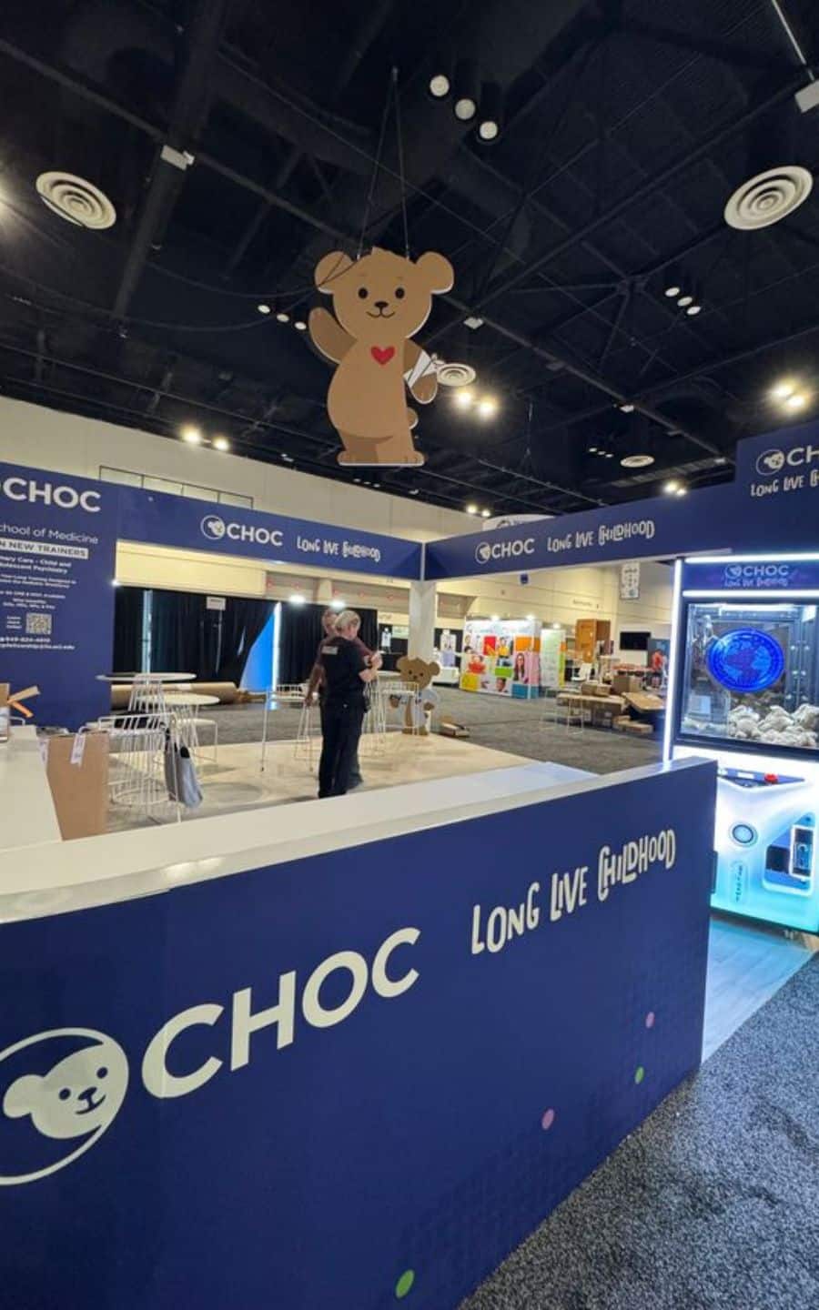 Custom Booth and Claw Machine and Hanging Bear