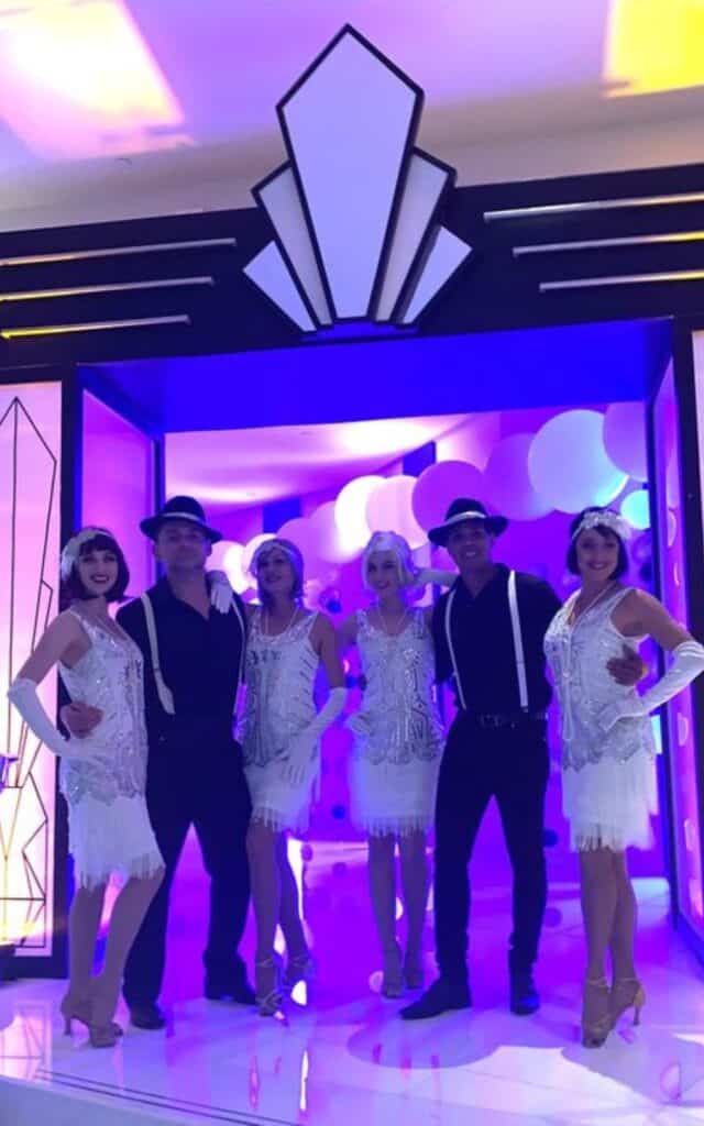 Illuminated Art Deco Entrance with 20s flapper dancers